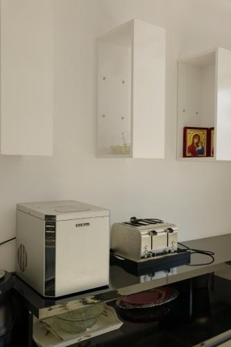 Η κουζίνα ή μικρή κουζίνα στο Niro Residence