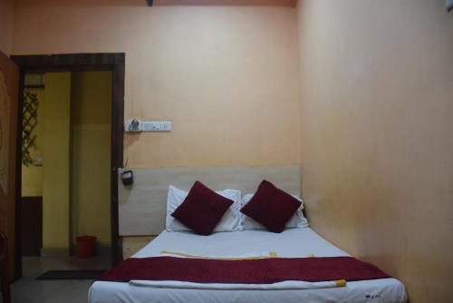 Cama o camas de una habitación en Hotel Thakur Ji
