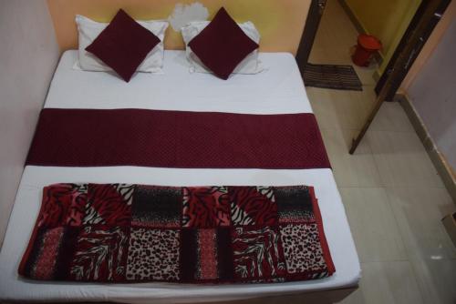 Cama o camas de una habitación en Hotel Thakur Ji