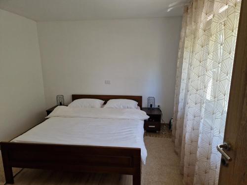 Postel nebo postele na pokoji v ubytování Sofija, Guests House