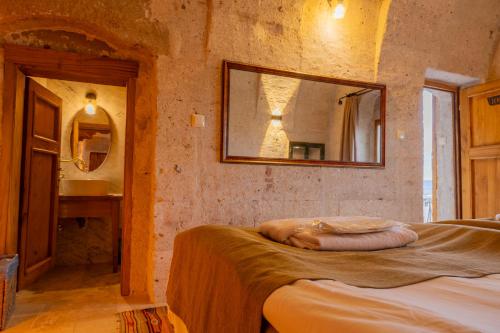 Carmin Cave Hotelにあるベッド