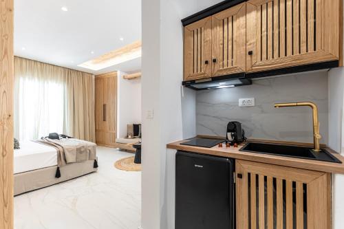 Ένα ή περισσότερα κρεβάτια σε δωμάτιο στο V Luxury Apartments Naxos