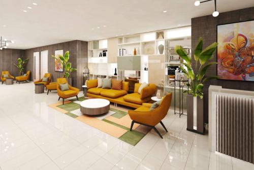 Lobbyn eller receptionsområdet på Ramada Encore Doha by Wyndham