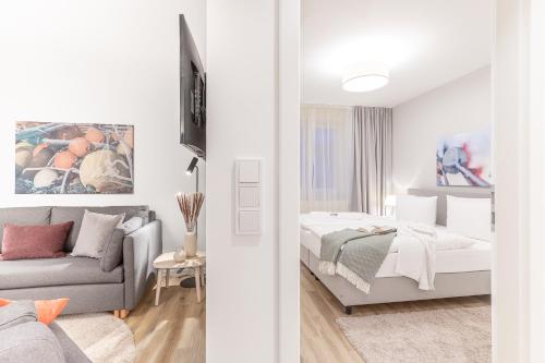 Postel nebo postele na pokoji v ubytování Villa Baltica Suiten & Sauna