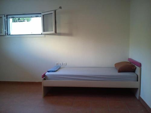Ένα ή περισσότερα κρεβάτια σε δωμάτιο στο Rent your own house in Pefki/Evoia.