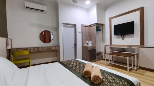 Μια τηλεόραση ή/και κέντρο ψυχαγωγίας στο The Nutshell Chalet Langkawi