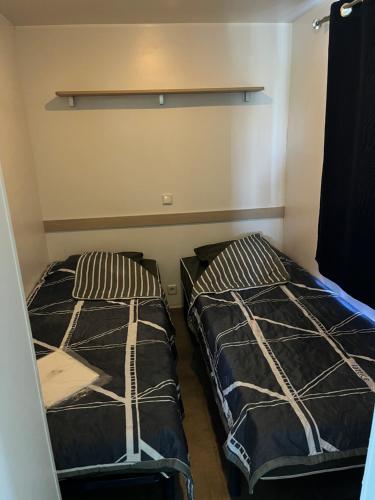 Postel nebo postele na pokoji v ubytování Mobile home