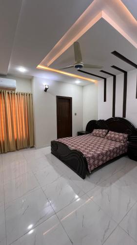 Кровать или кровати в номере Valley Homes Guest House