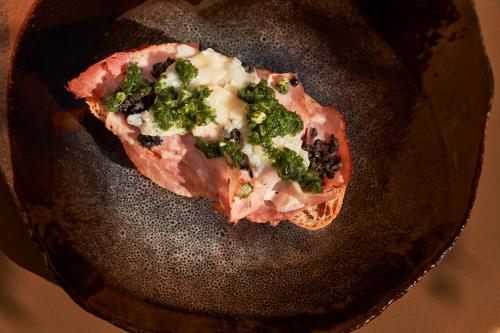 a piece of food with broccoli on a plate at Domaine de Panery in Pouzilhac