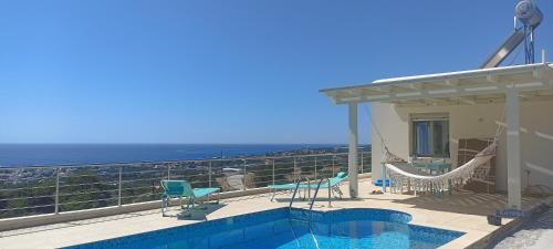 O Kairos , piscine, vue panoramique sur la mer, tranquillité