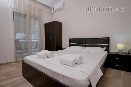 Кровать или кровати в номере Golden Beach Apartment