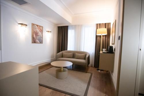 a living room with a couch and a table at La Quinta by Wyndham Giresun in Giresun