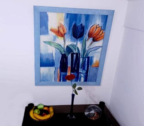 a painting of vases and flowers on a shelf at Apartment - MY DESTINATION in Slavonski Brod