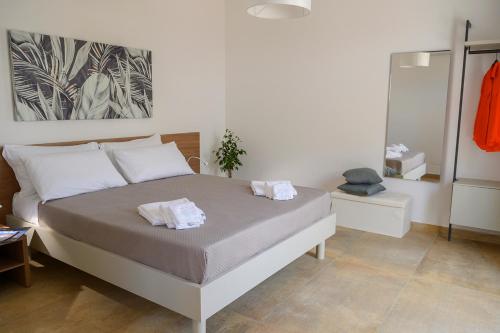 Posteľ alebo postele v izbe v ubytovaní Le 3 Rose apartments