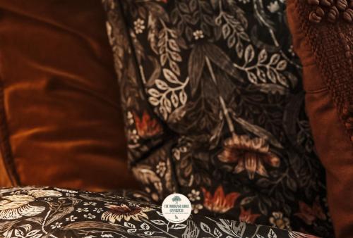 Letto o letti in una camera di The Woodland Lodge Gisselfeld