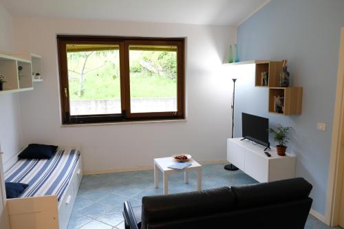 Μια τηλεόραση ή/και κέντρο ψυχαγωγίας στο Gli Ulivi Apartment