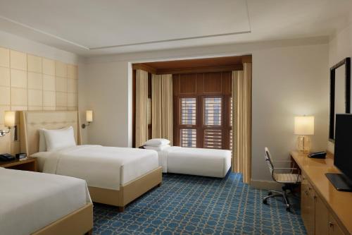 Hilton Hotel & Convention Jabal Omar Makkahにあるベッド