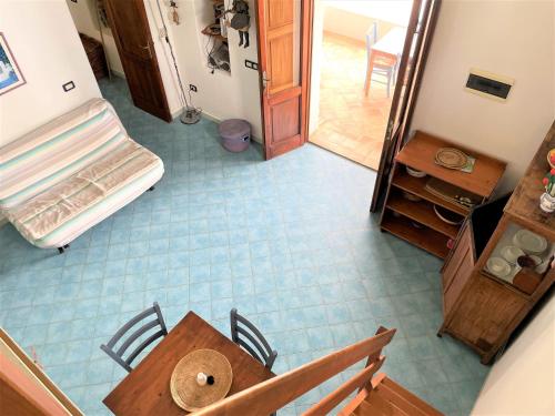 Postel nebo postele na pokoji v ubytování Casa La Papera - in centro a Malfa