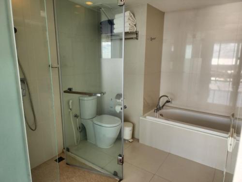 a bathroom with a toilet and a bath tub at Andaman sea view private in Patong Beach