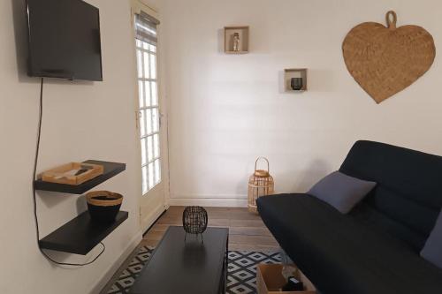 Μια τηλεόραση ή/και κέντρο ψυχαγωγίας στο Appartement de charme avec vue panoramique 4 pers