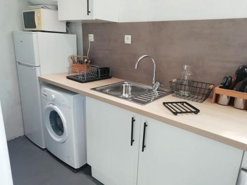 Η κουζίνα ή μικρή κουζίνα στο Appartement de charme avec vue panoramique 4 pers