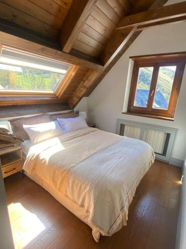Ένα ή περισσότερα κρεβάτια σε δωμάτιο στο DUPLEX con encanto en Bagergue