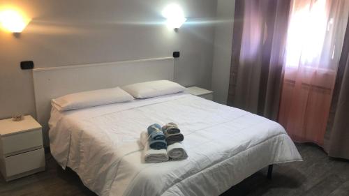 Postel nebo postele na pokoji v ubytování VILLA MORELLIS