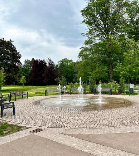 a fountain with four fountains in a park at Ferienwohnung HAPPYHOME Bahnhofnah gemütlich familiär in Arnstadt