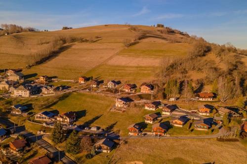 an aerial view of a village on a hill at Chalet Altitude - Vue panoramique - 8 pers in Bernex