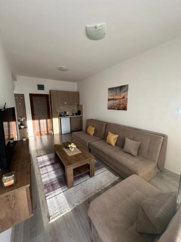 a living room with a couch and a table at Apartments Amar in Ulcinj
