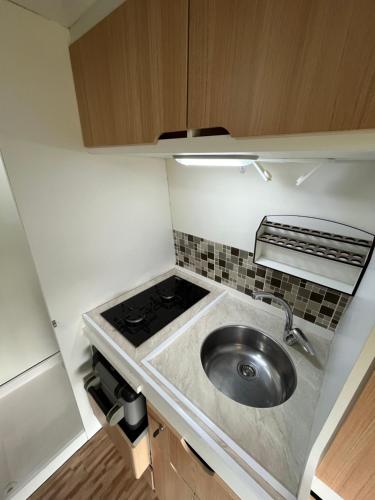 Dapur atau dapur kecil di Pousada Recanto Primavera