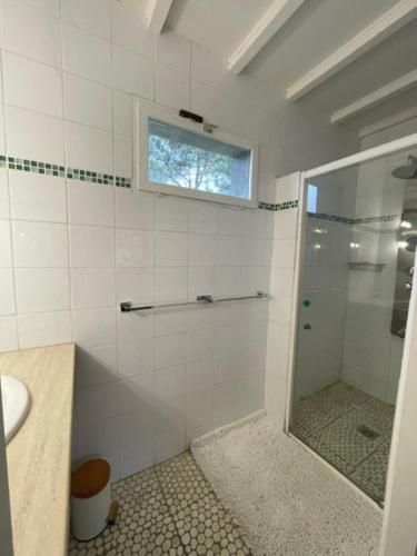 a bathroom with a shower and a sink at A POUTET in Labarthète