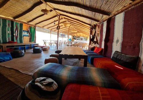 a room with couches and a table in a tent at LA GRANJA in Tetouan