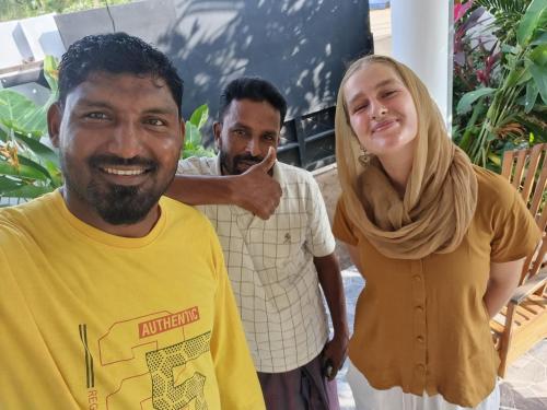 a man and a woman posing for a picture at Nilaveli Guest House in Nilaveli