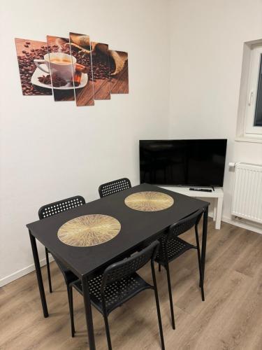 Televisyen dan/atau pusat hiburan di Gemütliches Zimmer in Rheinnähe