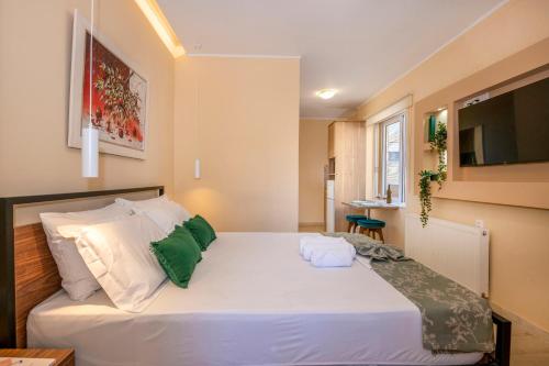 Postel nebo postele na pokoji v ubytování Upper Samitos Rooms