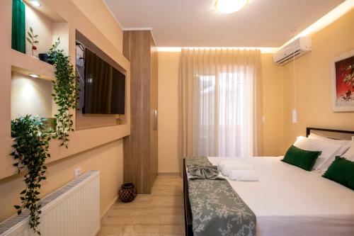 Postel nebo postele na pokoji v ubytování Upper Samitos Rooms