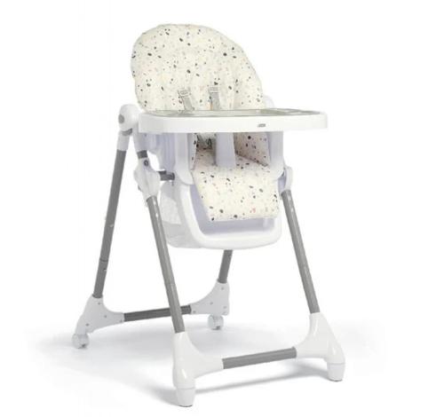 a white high chair with a high table at Nerria's Villa in Kalamaki Chanion