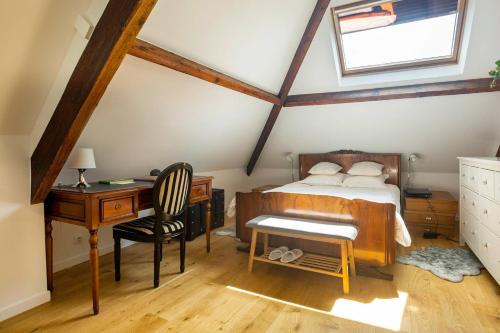 Ένα ή περισσότερα κρεβάτια σε δωμάτιο στο Chambre confortable JO 2024