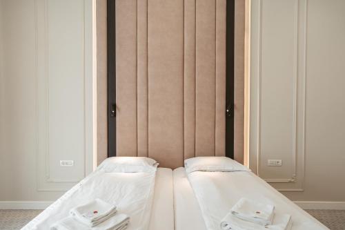 Katil atau katil-katil dalam bilik di Astoria Grand Hotel