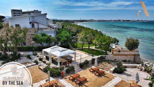 an aerial view of a building and the ocean at Aurelia Sea View in Torre Canne