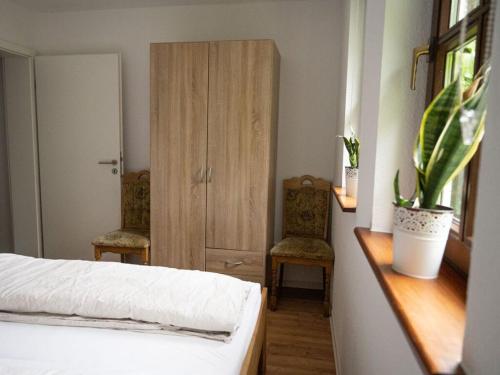 Katil atau katil-katil dalam bilik di Charming apartment in Buch