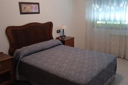 Postel nebo postele na pokoji v ubytování Casa o Pontillón