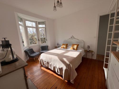 Ένα ή περισσότερα κρεβάτια σε δωμάτιο στο Villa du casino