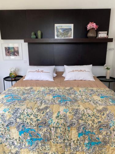 a bedroom with a large bed with a map on it at Luxury Villa with Pool & Sea View-10 Minutes from Monaco in Èze