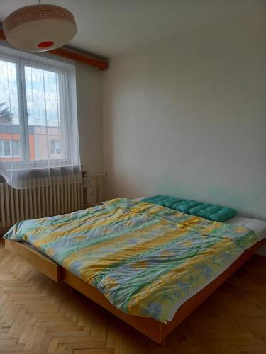 Postel nebo postele na pokoji v ubytování Apartmán Kyjov