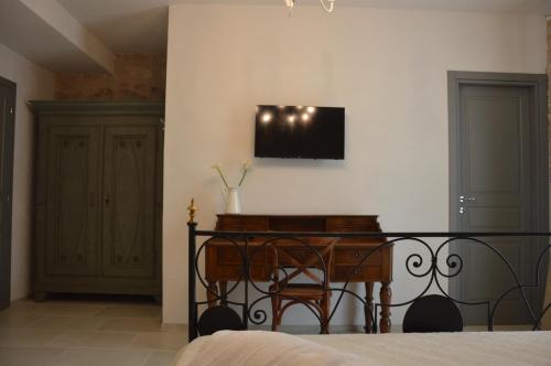TV a/nebo společenská místnost v ubytování B&B Casa Anaceta