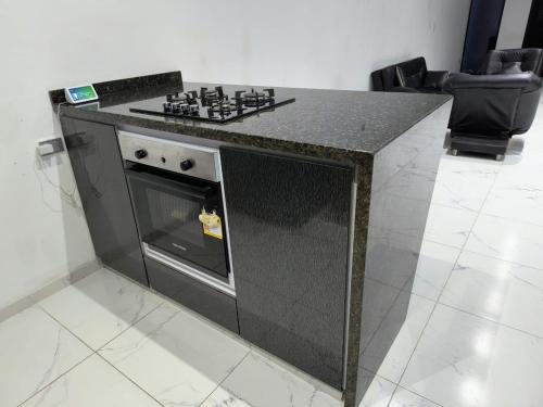 Kuchyň nebo kuchyňský kout v ubytování Ricaurte Cundinamarca Casa con piscina