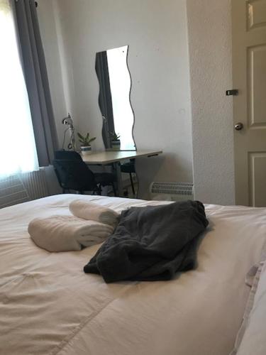 Posteľ alebo postele v izbe v ubytovaní Rusholme Manchester