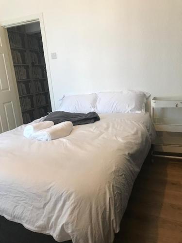 Posteľ alebo postele v izbe v ubytovaní Rusholme Manchester
